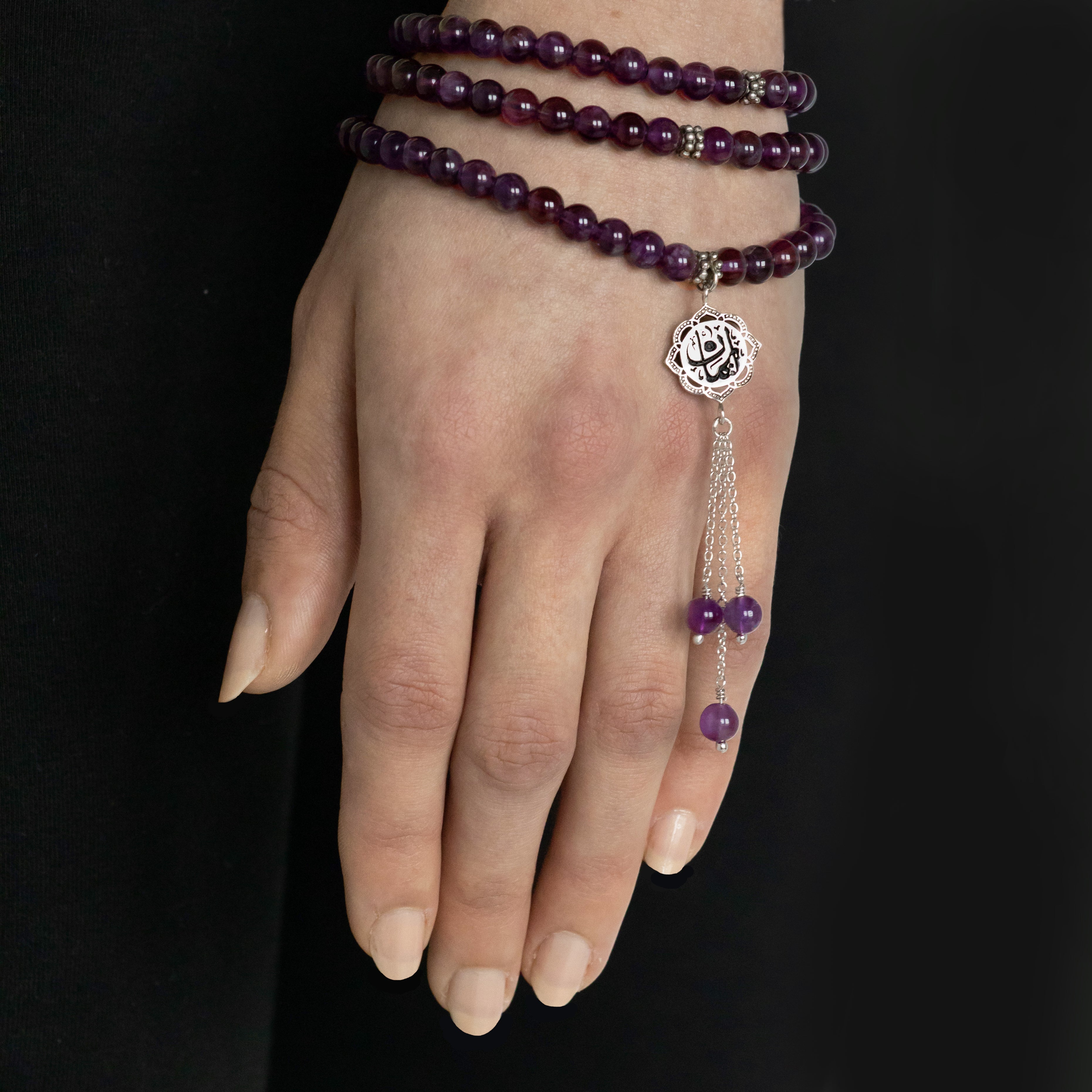 Faith Arabic calligraphy prayer beads: amethyst tasbih worn