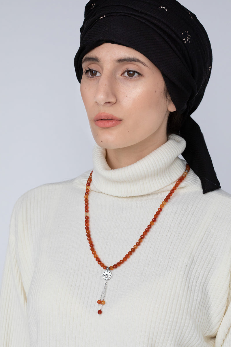 Faith Arabic calligraphy prayer beads: carnelian (aqeeq) tasbih worn